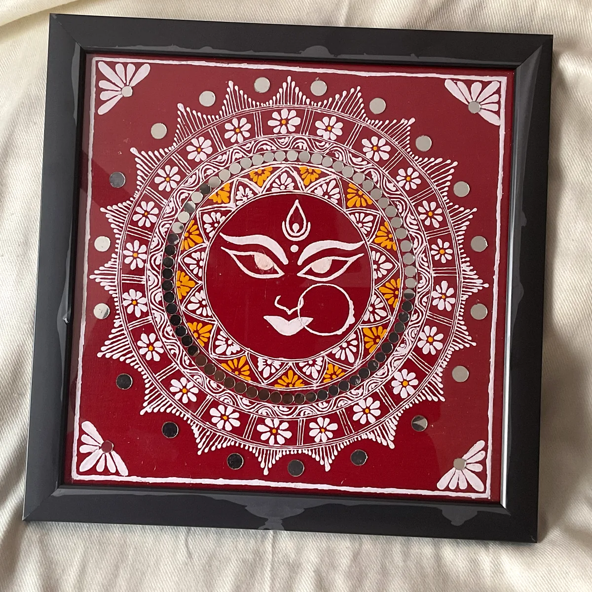 Maa Durga Aipan in a black frame